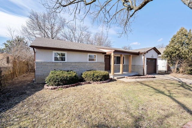 single story home featuring a garage, stone siding, a front lawn, and stucco siding