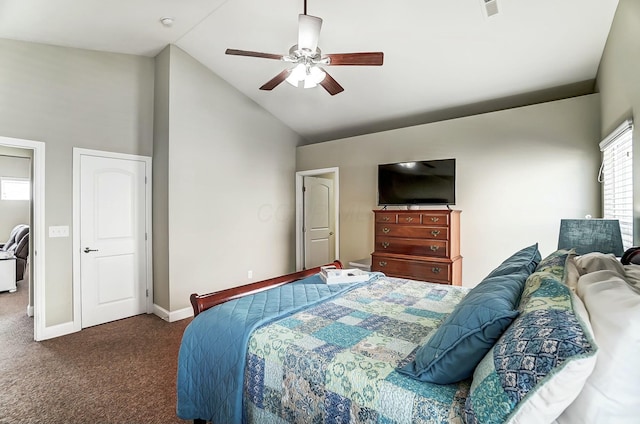 carpeted bedroom with ceiling fan, baseboards, and vaulted ceiling