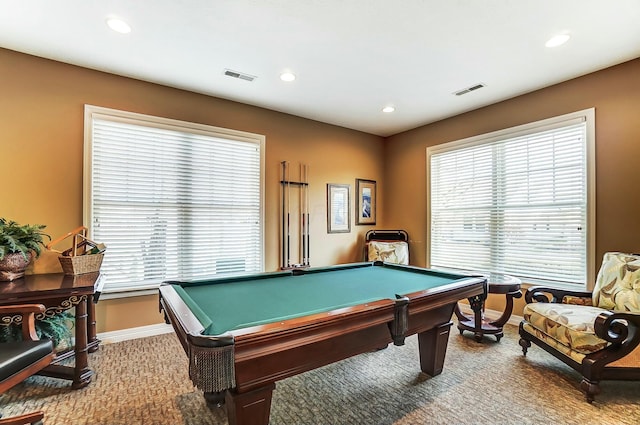 rec room featuring carpet floors, a healthy amount of sunlight, baseboards, and visible vents