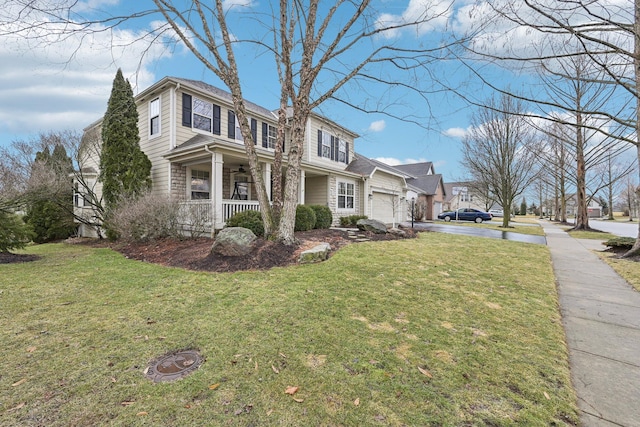 view of front facade featuring driveway, an attached garage, a porch, and a front yard