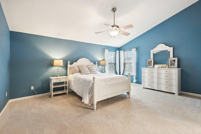 bedroom featuring lofted ceiling, carpet floors, baseboards, and a ceiling fan