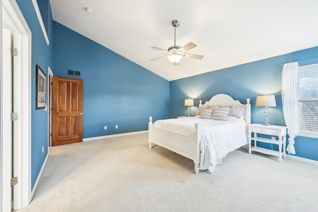 bedroom with visible vents, carpet flooring, vaulted ceiling, ceiling fan, and baseboards