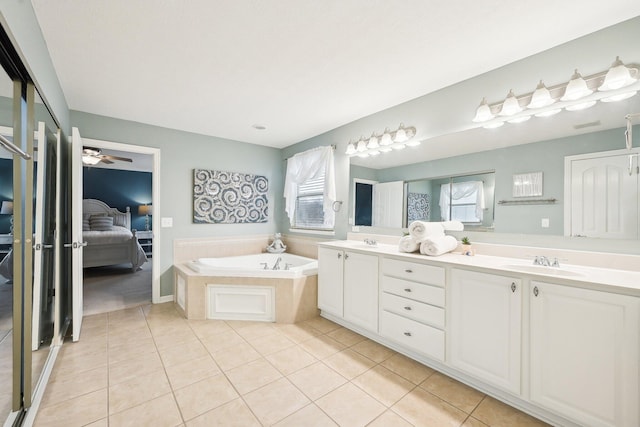 full bath featuring tile patterned flooring and a sink