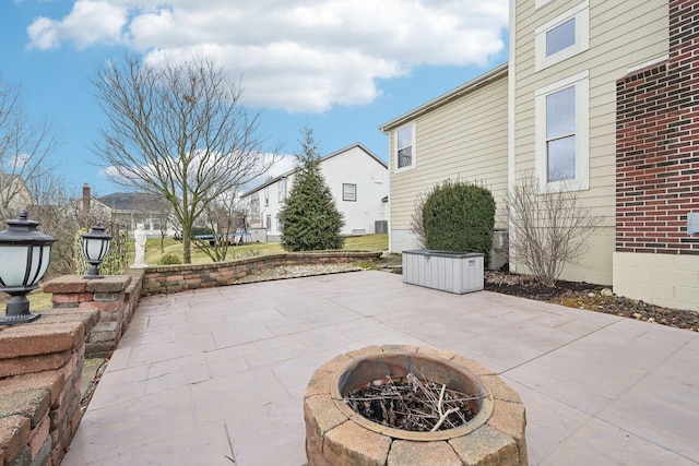 view of patio featuring an outdoor fire pit