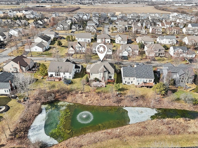 aerial view with a water view and a residential view