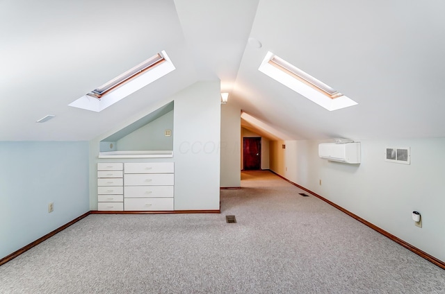 bonus room featuring carpet floors, visible vents, vaulted ceiling, and baseboards