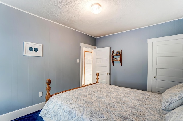 bedroom featuring a textured ceiling