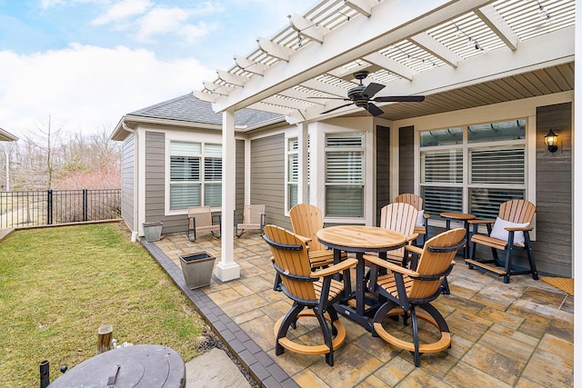 view of patio / terrace with ceiling fan, fence, a pergola, and outdoor dining space