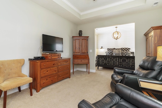 living area with a tray ceiling, visible vents, ornamental molding, light carpet, and baseboards