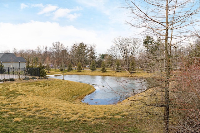 view of water feature with fence