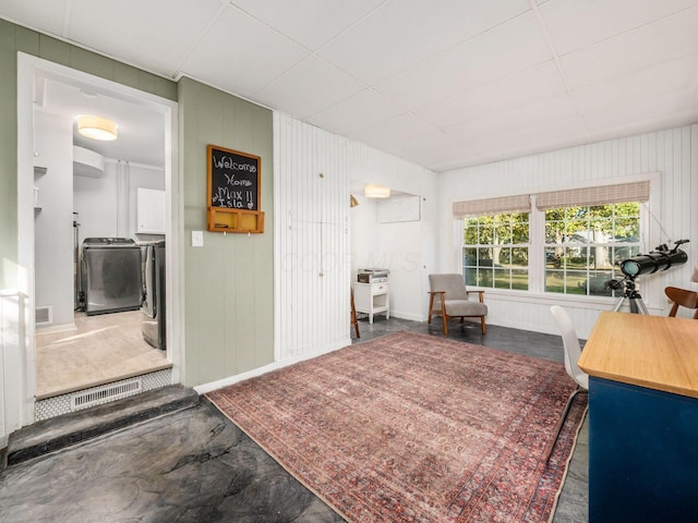 interior space featuring washer and dryer, visible vents, and baseboards