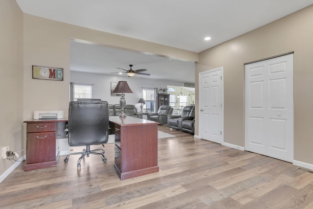 office area featuring wood finished floors and a healthy amount of sunlight