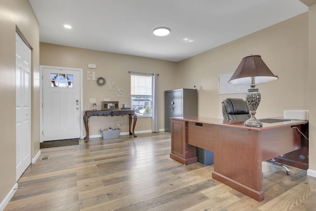 office area with recessed lighting, light wood-style flooring, and baseboards