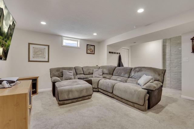 living area featuring light carpet, baseboards, and recessed lighting