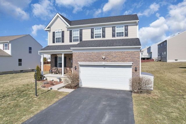 view of front of property featuring a garage, brick siding, driveway, and a porch