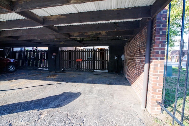 view of gate with fence