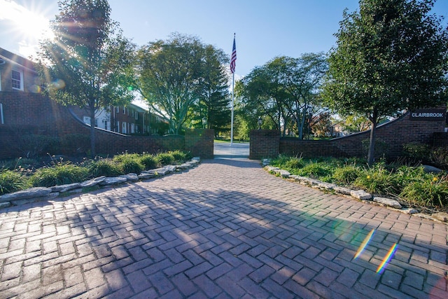 view of home's community featuring fence private yard