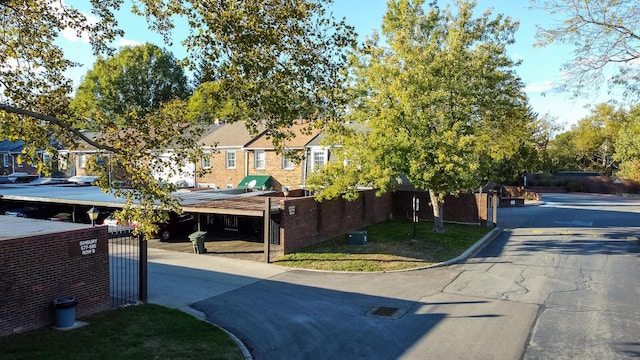 view of front of house featuring fence