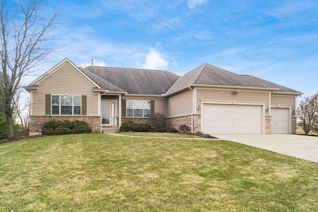 view of front of property featuring roof with shingles, concrete driveway, a garage, stone siding, and a front lawn