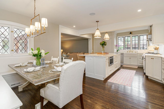 dining room featuring recessed lighting, visible vents, and dark wood finished floors