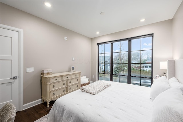 bedroom featuring baseboards, dark wood finished floors, access to exterior, and recessed lighting