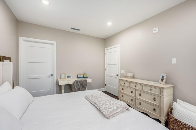 bedroom with recessed lighting and visible vents