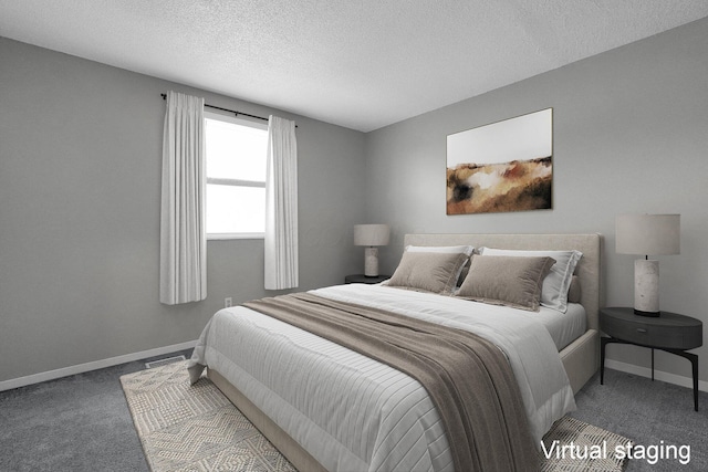 carpeted bedroom with a textured ceiling and baseboards