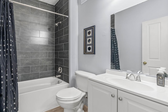 full bathroom featuring toilet, shower / bathtub combination with curtain, and vanity