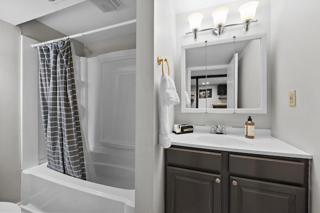 full bath featuring vanity and shower / tub combo with curtain