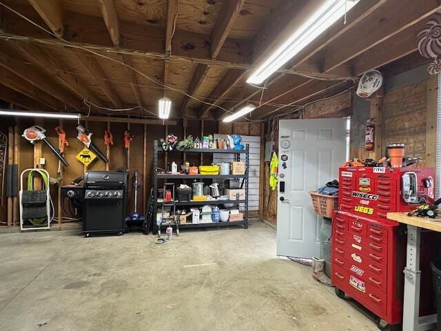 garage with a workshop area