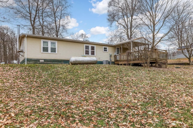 rear view of house with a deck