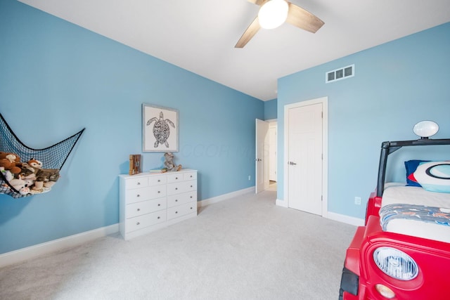 bedroom featuring a ceiling fan, carpet flooring, baseboards, and visible vents