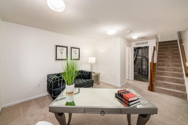 rec room with gas water heater, carpet flooring, baseboards, and visible vents