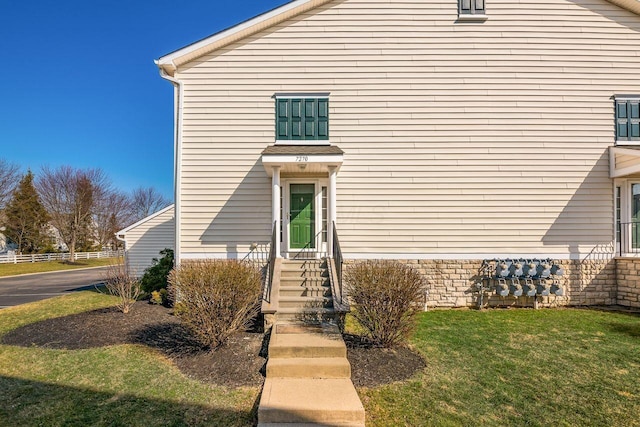 view of front of home with a front yard