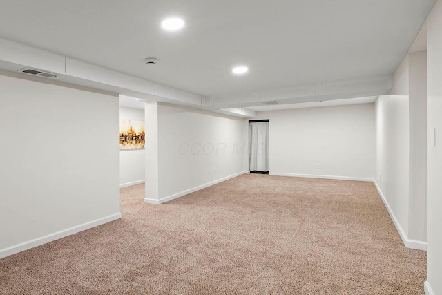 finished basement with recessed lighting, carpet, visible vents, and baseboards