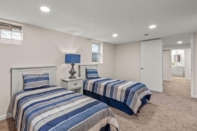 bedroom featuring recessed lighting, multiple windows, carpet, and baseboards