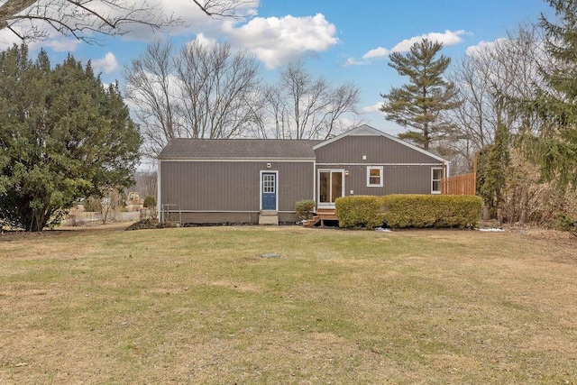 view of front of house with a front lawn