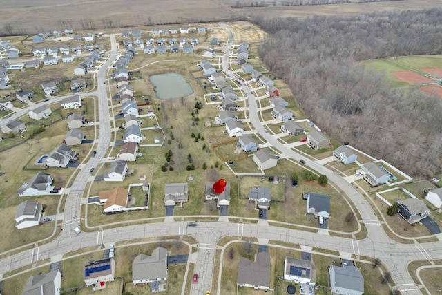 birds eye view of property with a residential view