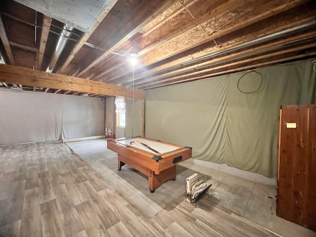 basement featuring wood finished floors