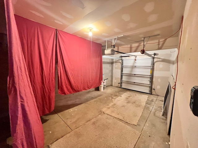 1396 Spring Village Dr, Mansfield, OH 44906 - garage featuring a garage door opener