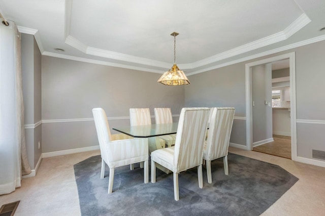 dining space with visible vents, ornamental molding, baseboards, and carpet floors