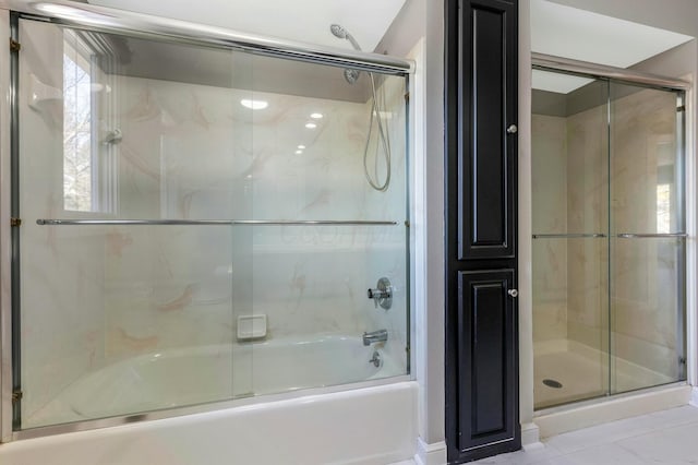 full bath with bath / shower combo with glass door