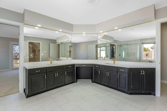 full bathroom featuring recessed lighting, vanity, marble finish floor, and a shower stall