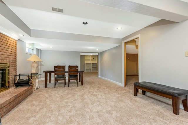 carpeted dining room featuring visible vents, recessed lighting, a fireplace, and baseboards