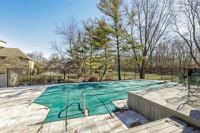 view of pool with fence