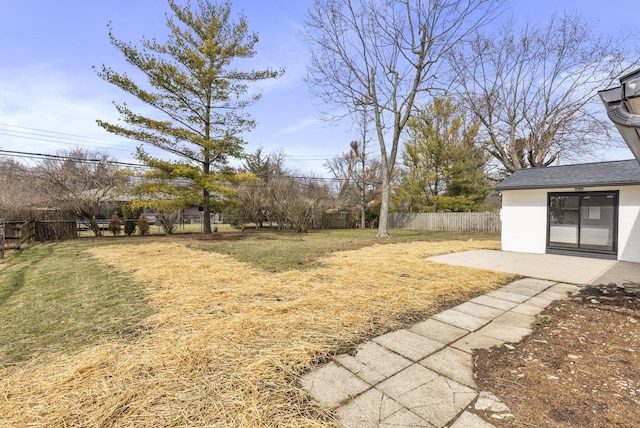 view of yard with a patio area and a fenced backyard