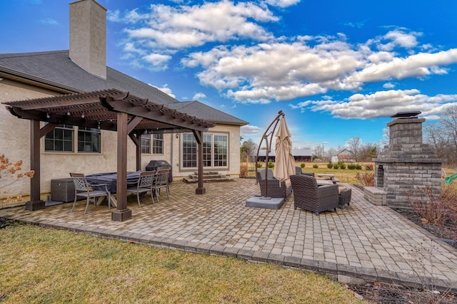 view of patio with entry steps, grilling area, and a pergola