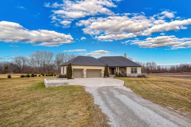 view of front of property with a garage, concrete driveway, stone siding, a chimney, and a front yard