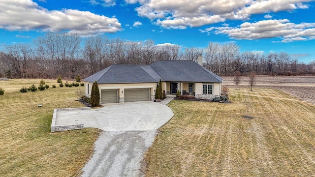 view of front of property featuring a garage, concrete driveway, stone siding, a chimney, and a front yard