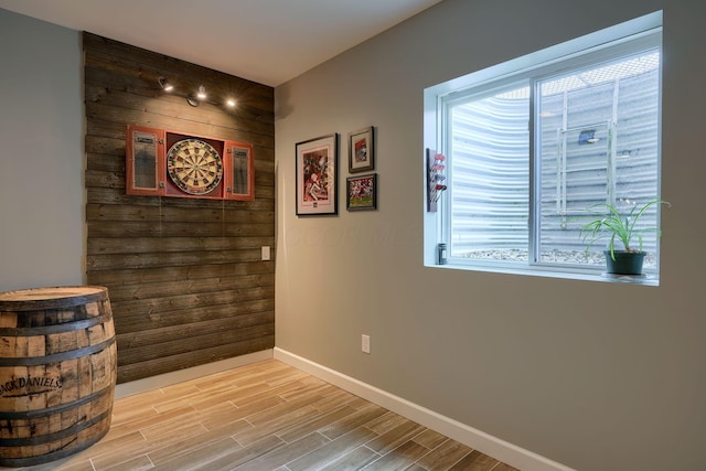interior space with light wood-style flooring and baseboards